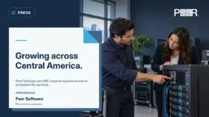 Peer Software press release on the IMC distribution partnership in Central America; illustrative enterprise IT partner demonstration lab.