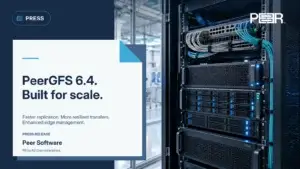 PeerGFS 6.4 performance and edge data management release, illustrated with a compact edge installation beside advanced manufacturing.